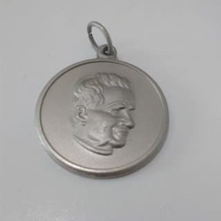 Imagen de producto Medalla de hierro 30 mm con imagen estampada. Art. MHI 180